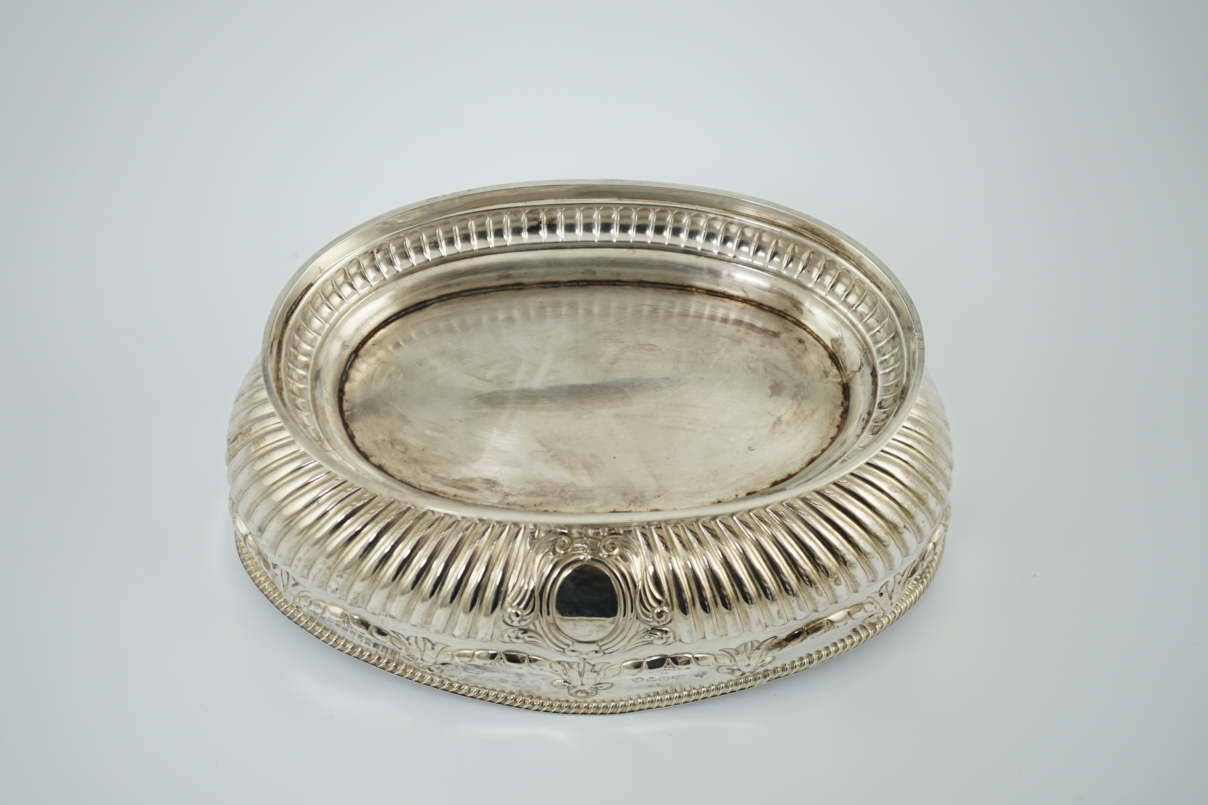 A late Victorian demi-fluted silver oval fruit bowl, by Martin, Hall & Co